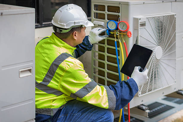 Professional Hvac technician working in Groveton, TX